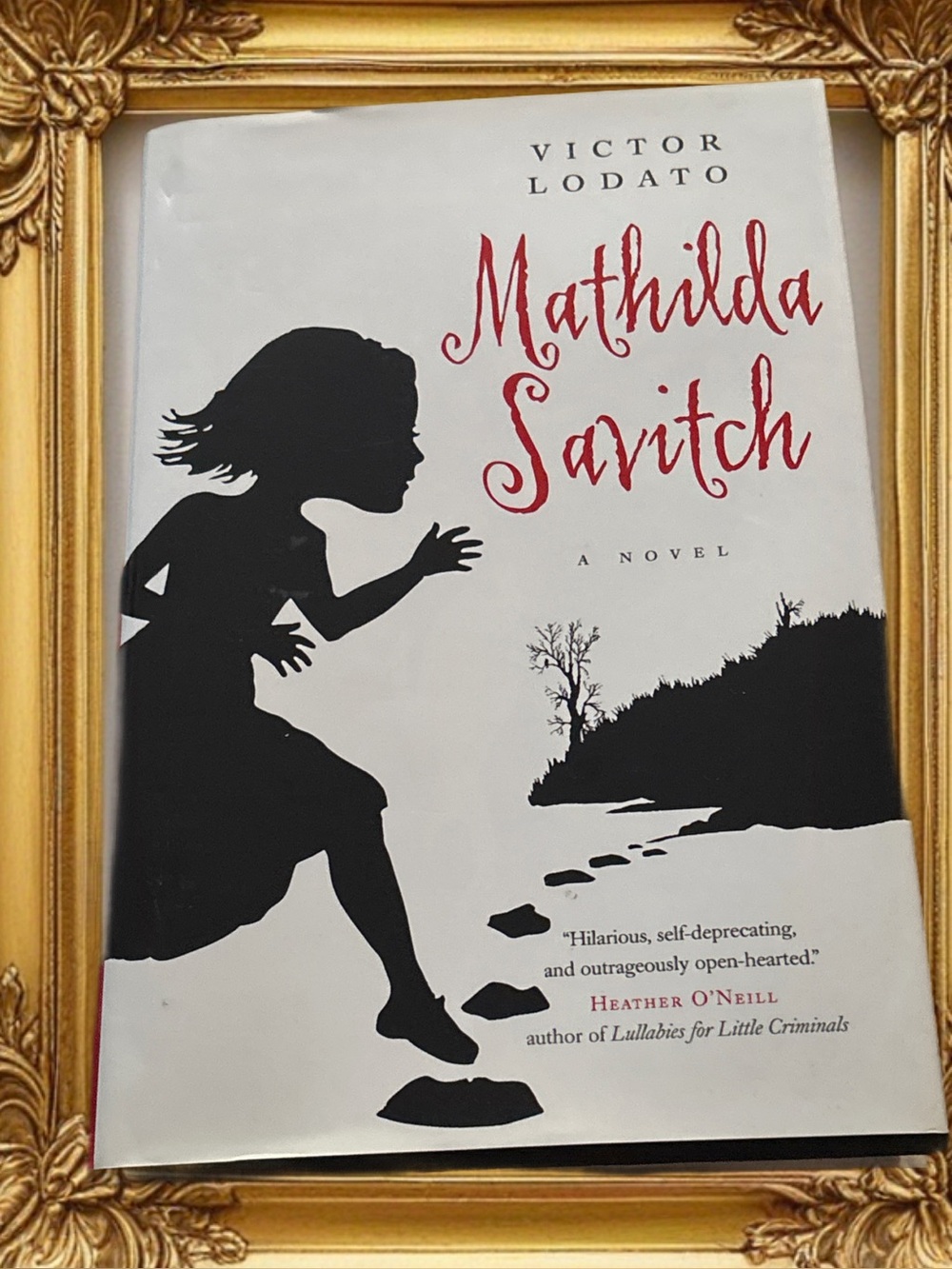 Victor Lodato Mathilda Savitch Hardcover Novel - White, Black & Red Cover